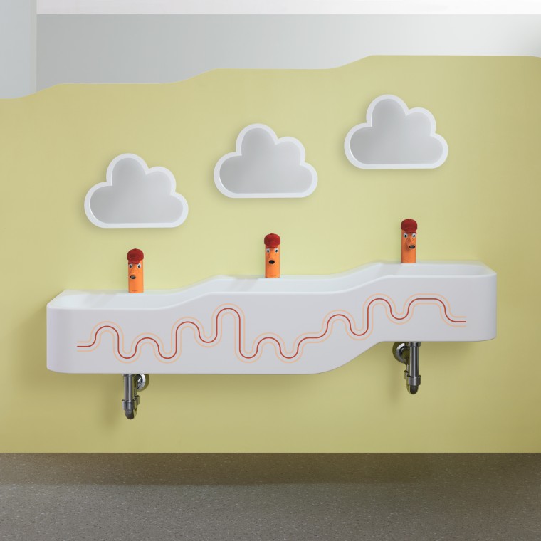 Geberit Bambini -leikki- ja pesuympäristö karmiininpunaisena ja oranssina