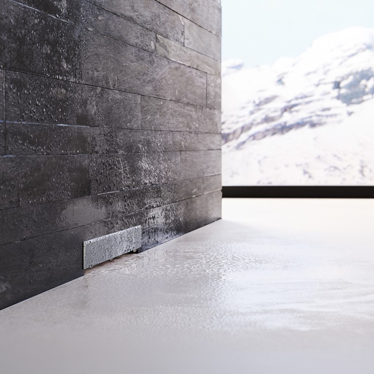 Geberit-seinäkaivo mustassa muuratussa seinässä Geberit-seinäkaivo mustassa muuratussa seinässä