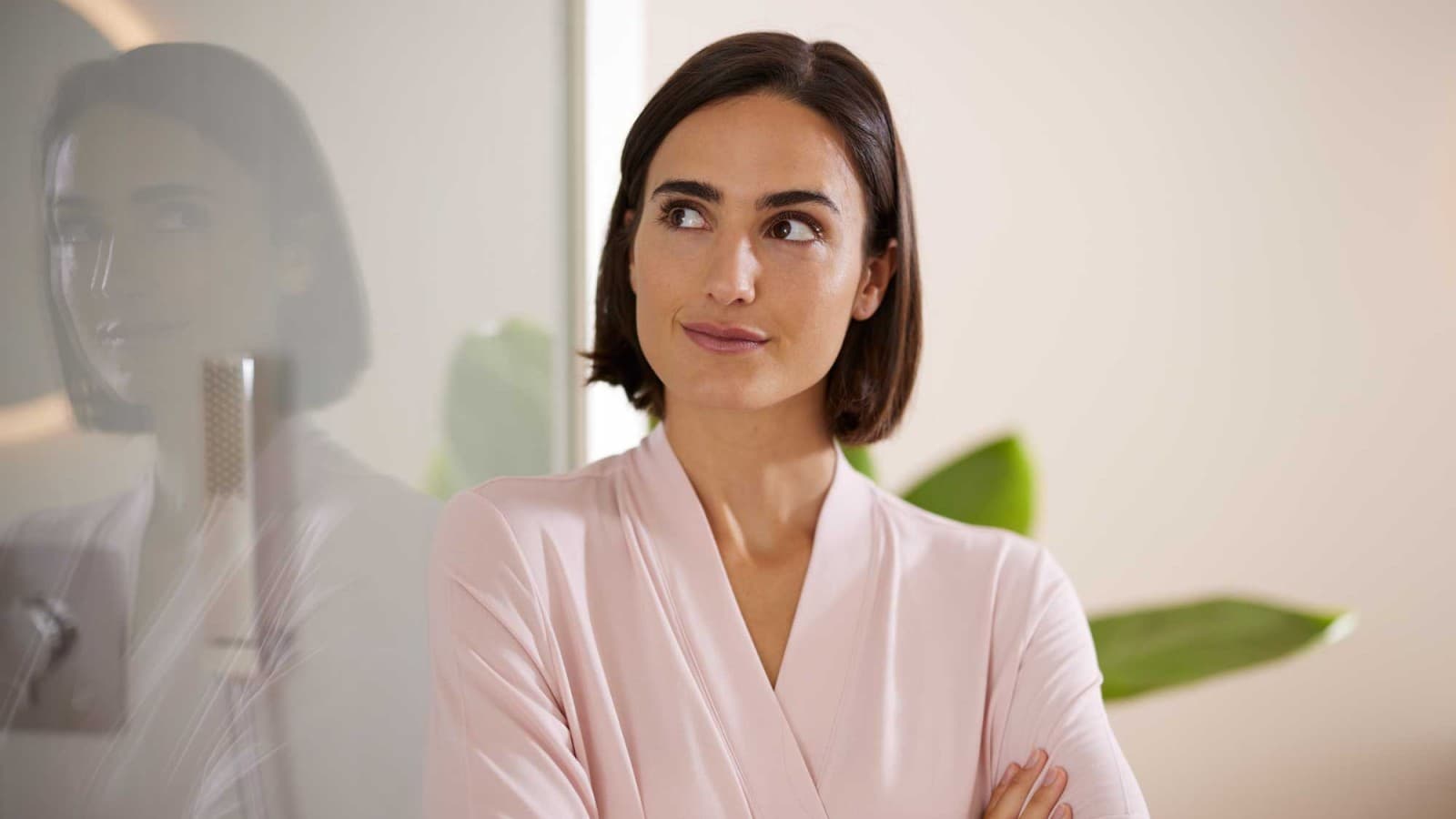 Thoughtful woman in bathroom Thoughtful woman in bathroom