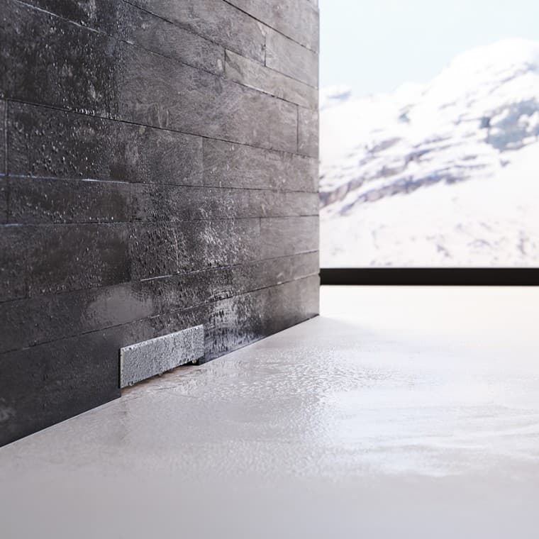 Geberit-seinäkaivo mustassa muuratussa seinässä Geberit-seinäkaivo mustassa muuratussa seinässä