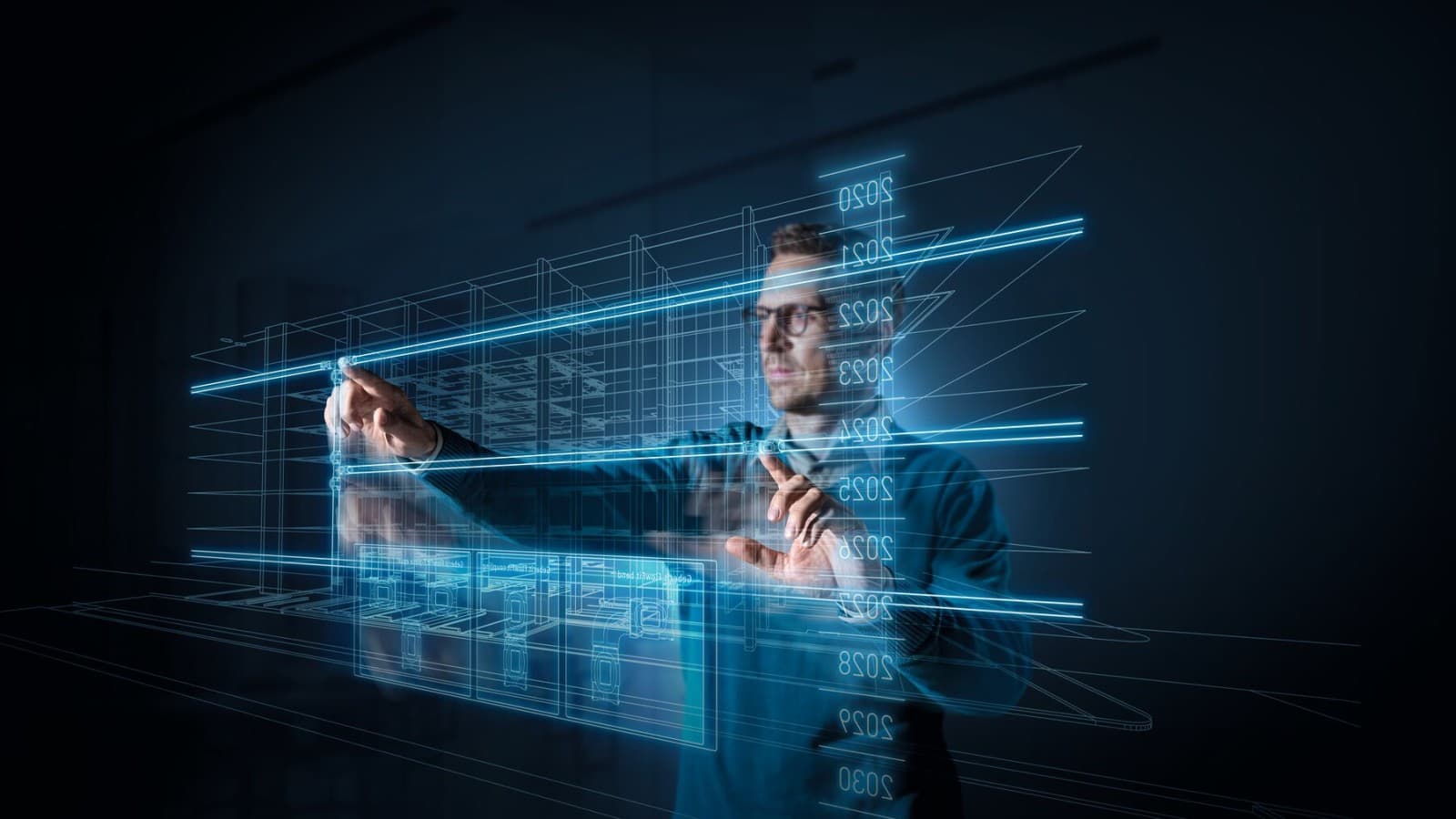 Suunnittelija näytön edessä Suunnittelija näytön edessä